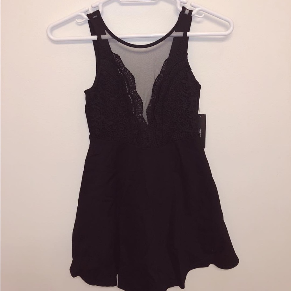 Black a-line dress with sheer detailing
